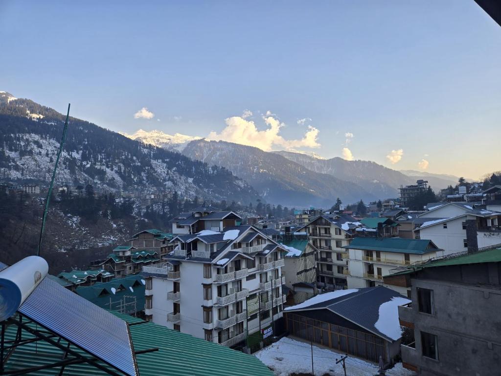 Snow-covered Manali village view from The Hammock Hotel